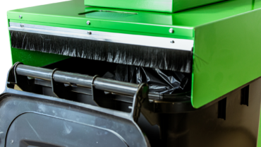 Bin Press brush system