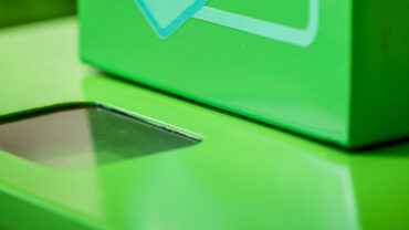 Viewing glass on bin press to see bin in operation