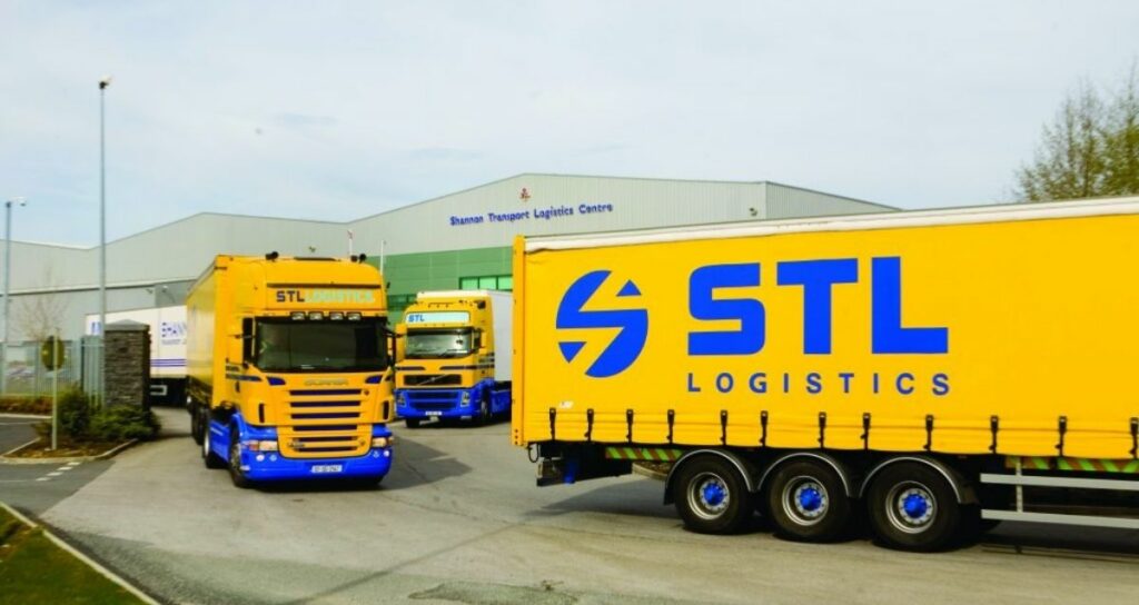 STL logistics trucks leaving depot