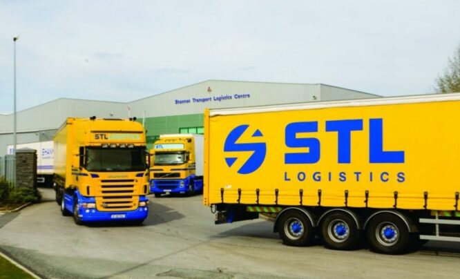 STL logistics trucks leaving depot